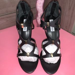 Black Steve Madden heels w/gold button-like design